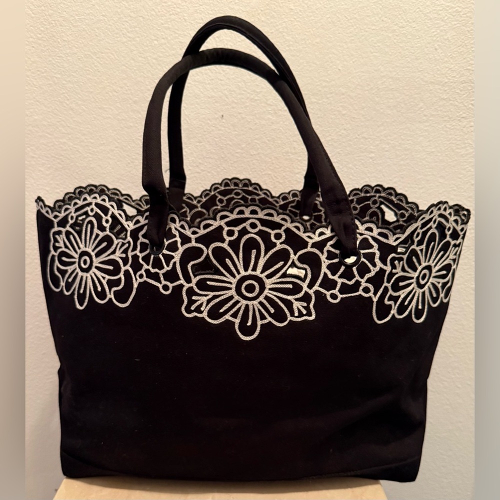 Carlisle white, floral, embroidered black tote. 10”x17”